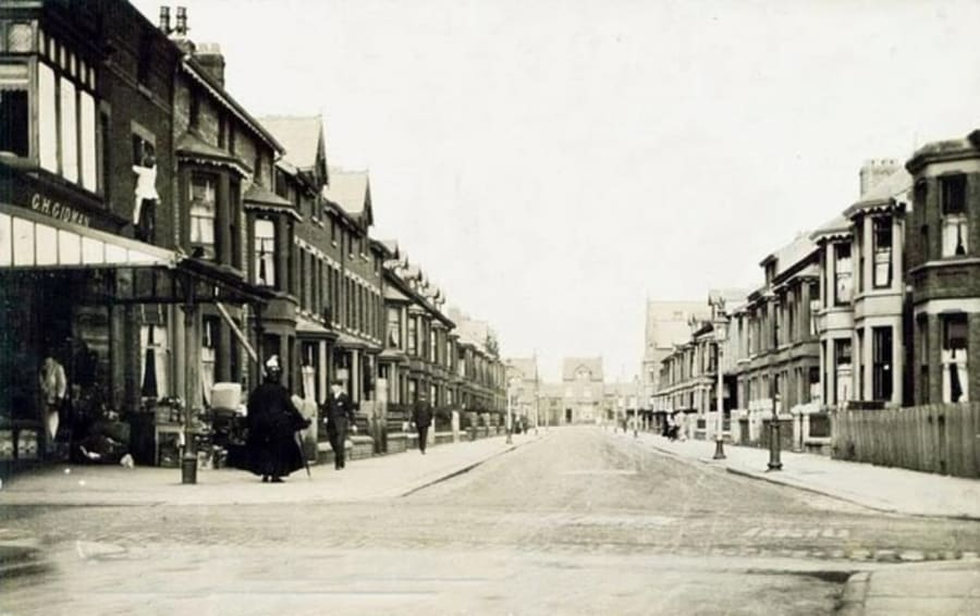 Sepia photograph looking down Crystal Road from the Promenade end, with St. Cuthbert's Church visible at the far end
