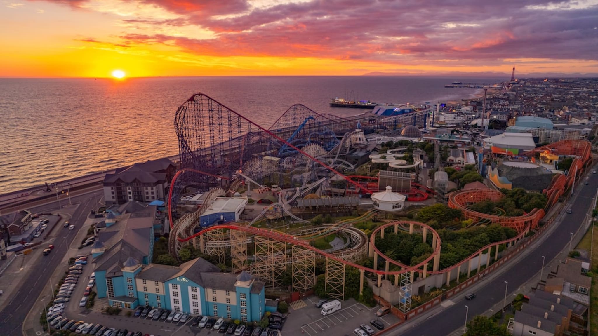 Blackpool Pleasure Beach rollercoasters at sunset