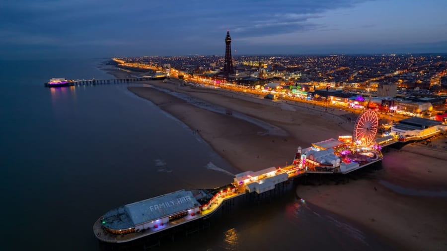 Aerial view of Central Pier and its big wheel at dusk