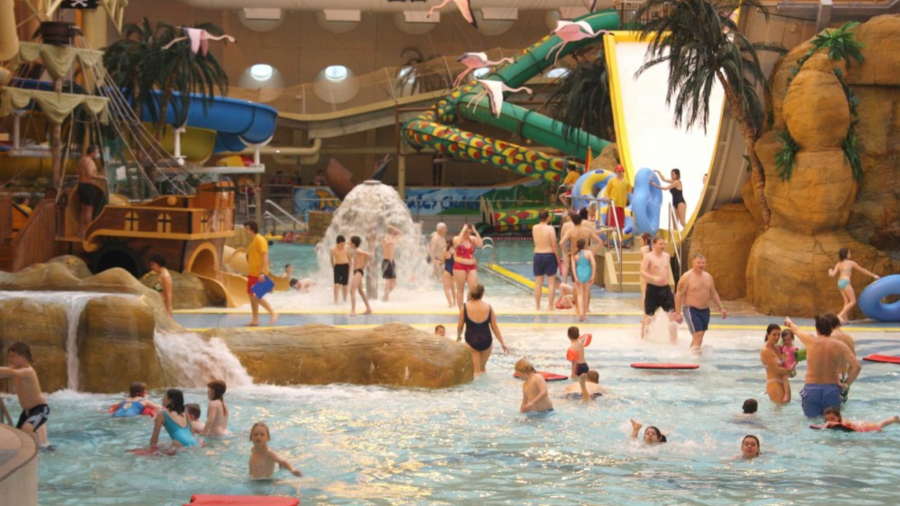 Families swimming in the indoor pool at Sandcastle Waterpark